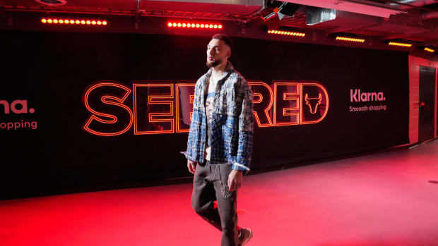 Chicago Bulls guard Zach LaVine (8) walks into the United Center before a game against the Charlotte Hornets. 